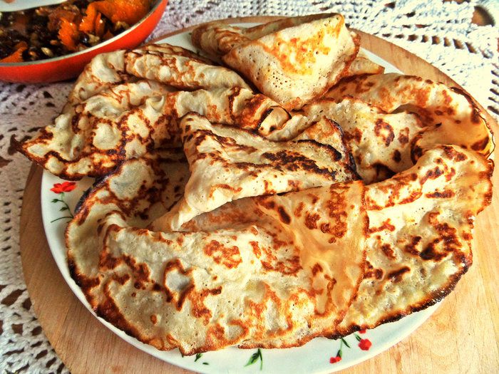 Блины с кокосом под апельсиновым соусом