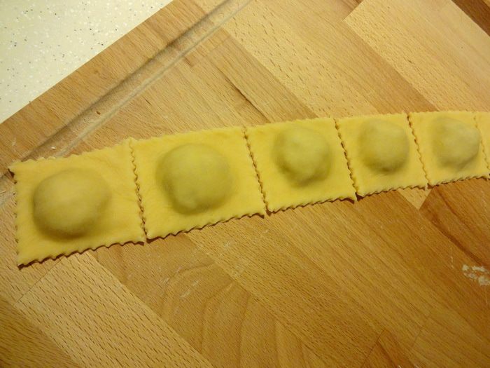 Равиоли с мясным соусом