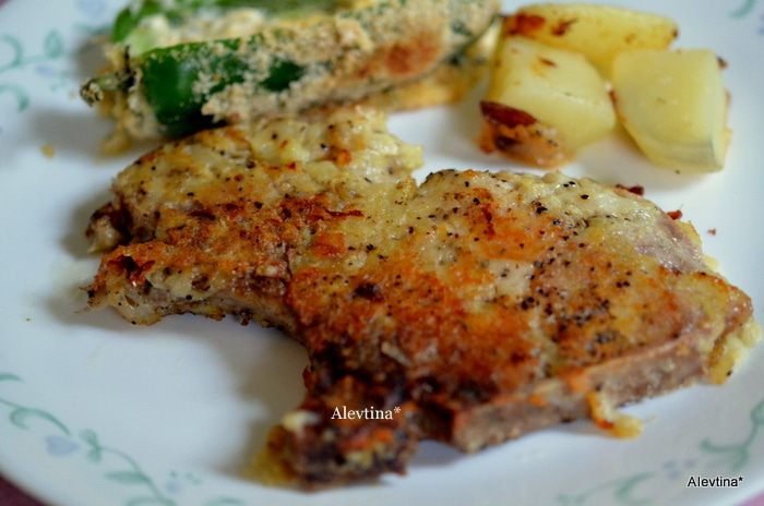  Свиные отбивные в картофеле