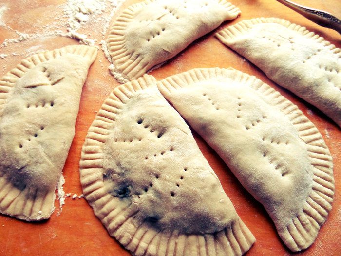 Рыбные кальцоне со шпинатом и рисом